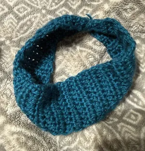 Hand knitted blue headband thumbnail 1
