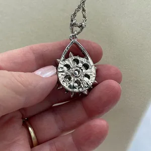 Sapphire CZ’ large flower pendant on a long 21” rope chain thumbnail 4