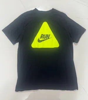 Nike “RUN” graphic t-shirt featuring a bold neon yellow triangle logo thumbnail 1