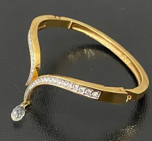 SWAROVSKI Vintage Signed Gold-tone Hinged V Bangle With Teardrop Crystal Charm thumbnail 2