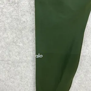 Alo Yoga High-Waist Ripped Warrior Legging in the color Hunter Green Size Large thumbnail 5