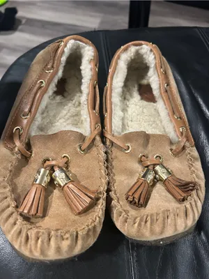 Womens Cozy Tassel Moccasin Slippers in Tan thumbnail 1