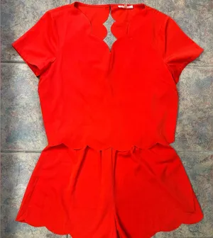 sugar + lips salmon colored scalloped romper with open back cutout thumbnail 1