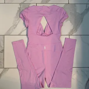 FREE PEOPLE MOVEMENT Pink bodysuit with cutout detail in back Size Small thumbnail 2