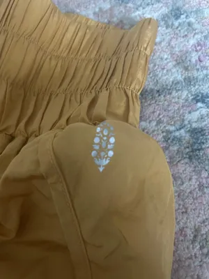 Yellow gold free people movement shorts thumbnail 3
