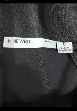 Nine West Black High waste/ wide leg pants - Size 8. Great pair of pants. Pockets on front & back. Gently warn & excellent condition. Mark on top is the iron over pockets, will wash out. Measurements approximately 16” waste x 11” rise x 39”. priced to sell at as is condition. None smoking home. Don’t like my price, make reasonable offer! thumbnail 5