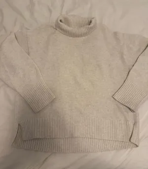 UNIQLO Cream Turtleneck Sweater thumbnail 1