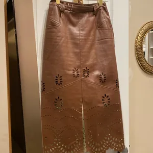 MIDI FAUX LEATHER SKIRT- XS. (Small tear see photo) thumbnail 2