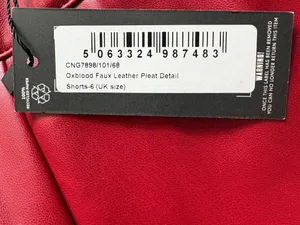 Pretty Little Thing faux leather red pleated shorts pockets women's size 2 thumbnail 2