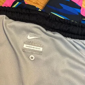 Nike Women’s Medium Blue Neon Lined Running Shorts Athletic Sporty Athleisure thumbnail 8