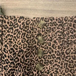 American Eagle mini skirts. Size: XXS / 00. Lot of 2. The green one is NWT. thumbnail 2