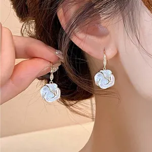 Gold and White Floral Earrings thumbnail 2