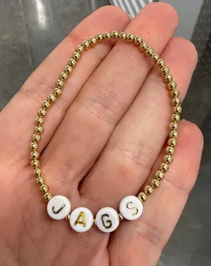 Jacksonville jaguars Gold Bead Bracelet with White Letter Beads - JAGS thumbnail 1