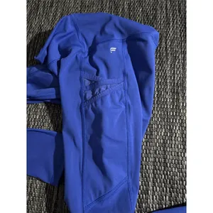 Fabletics Trinity Mid Rise 7/8 Pocket Leggings Royal Blue Size Small thumbnail 3