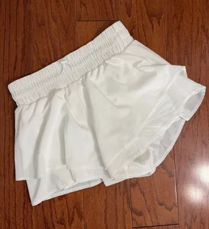 JoyLab White Athletic Flowy Activewear Workout Shorts - Size small. Gently warn and excellent condition. Under shorts with pockets. Measurements approximately 14” waste, not fully stretched out x 13.5” long x 13” rise. Non-smoking home. priced to sell at as is condition. Don’t like my price, make reasonable offer! And thank you for checking my closet. thumbnail 1
