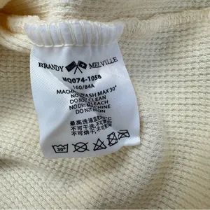 yellow Brandy Melville tee with a cute criss-cross detail thumbnail 5