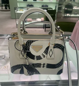 Prada white leather bag with black snack  thumbnail 1