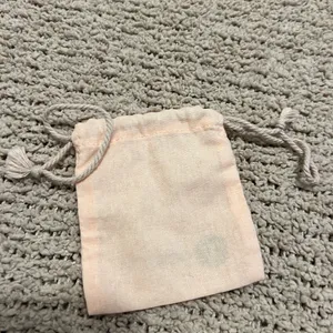 Gorjana Blush Pink Drawstring Jewelry Pouch with Gold Logo thumbnail 2
