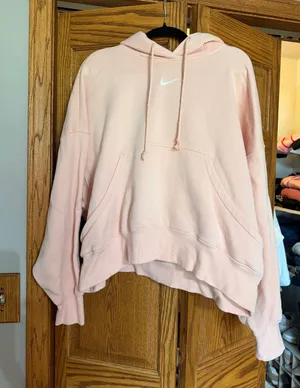 Nike Women's Light Pink Cropped Hoodie with White Swoosh thumbnail 1