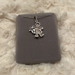 Silver child  with doll charm pendant thumbnail 2