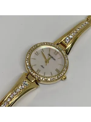 Armitron women’s watch gold tone 24mm mop dial quartz rhinestones running thumbnail 3