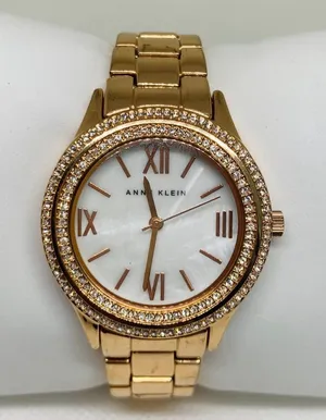 Anne Klein rose gold tone women watch mop dial 33mm Roman numerals 6” running thumbnail 1