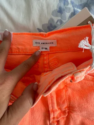 Good American orange jean shorts thumbnail 4