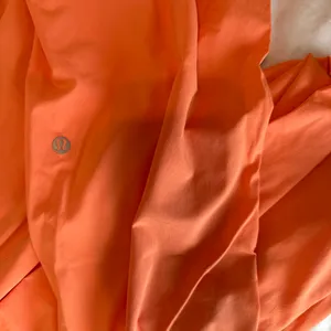 Lululemon size 4 Orange button-up pants Never worn! Brand new! #lululemon #new #buttonup #elastic thumbnail 2