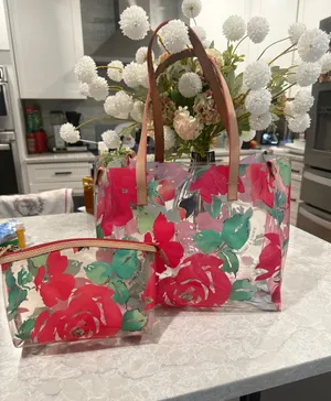 Dooney & Bourke clear PVC floral tote bag with matching makeup bag thumbnail 1