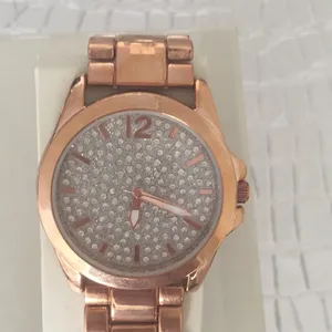 Rose gold watch with crystal encrusted face. thumbnail 2
