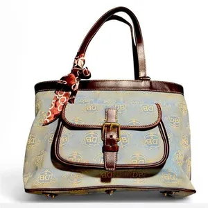 Dooney & Bourke East West Canvas / Leather Trim Donegal Crest Tote Shoulder Bag thumbnail 1