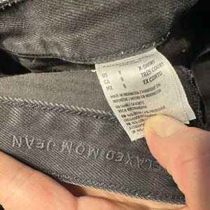 American Eagle black raw hem relaxed mom 8 x-short jeans thumbnail 2