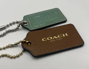 Coach Leather Tag Bag Charms Lot Of Two Blue Patent Brown Leather thumbnail 1