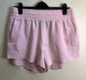 Under‎ Armour Light Pink Women's Athletic Shorts thumbnail 1