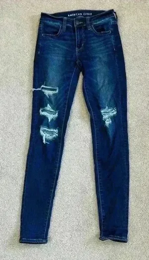 American eagle blue distressed jeggings in size 4 long thumbnail 1