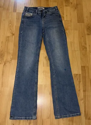 Rock and Roll Denim Cowgirl Women 26x32 distressed Mid Rise Bootcut Jeans thumbnail 1