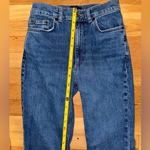 ASOS DESIGN high rise '70's' stretch flare jeans in midwash thumbnail 7