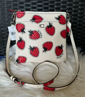 Coach Kitt Messenger Crossbody Bag With Strawberry Print thumbnail 1