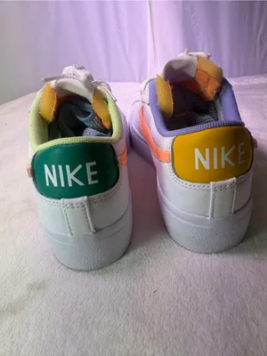 Nike Women’s White Sneakers with Peach Swoosh and Lavender Detail thumbnail 7