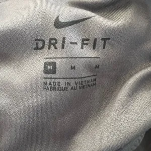 Nike Women’s Grey Athletic Shorts with lining insert and pockets size M thumbnail 4
