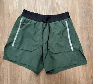 Nike Womens Forest Green Perforated Running Shorts Reflective‎ Size S 3in Inseam thumbnail 1