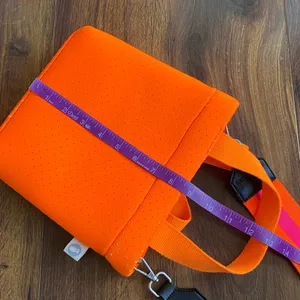 Quilted Koala Perforated Mini Scuba Crossbody Tote Bag Neon Orange With Straps thumbnail 10