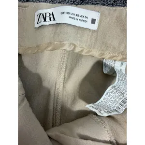 Zara Wide Leg Pants Womens XS Beige High Rise Pleated Flowy Pull On thumbnail 6