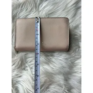 Kate Spade Adel Medium Bifold Wallet in pink and tan on the outside thumbnail 8