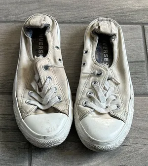 Converse Off-White Slip-On Sneakers well worn thumbnail 1