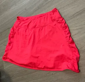 Women's Neon Coral Performance Mini Skirt Pink Size M thumbnail 1