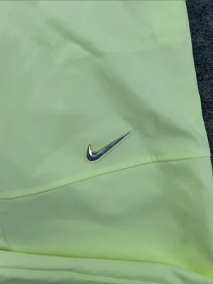 Nike Women's Sportswear Woven Pants in a bright neon green/yellow XS thumbnail 6
