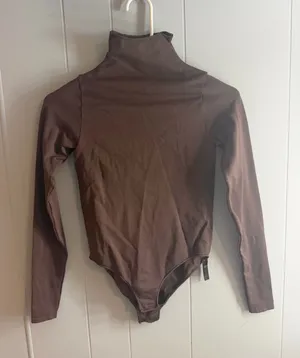 SKIMS Long Sleeve Bodysuit thumbnail 1