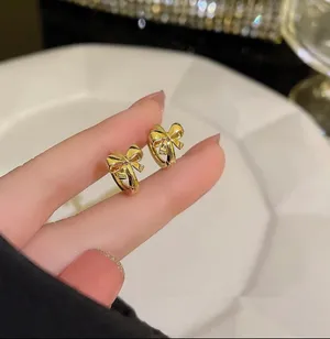 Gold Bow Chunky Hoops thumbnail 3