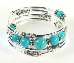 SLINKY BRACELET Women’s Coil Style‎ Bracelet with Charms Turquoise NWOT thumbnail 1